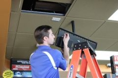 Owner Installing Drop Down Monitor